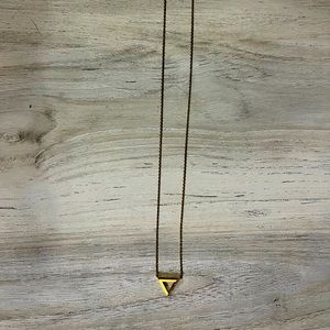 Gold necklace with diamond-like gems
